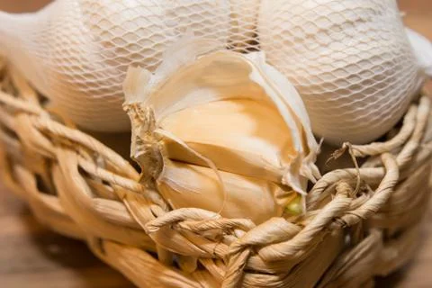 Garlic in basket Stock Photos