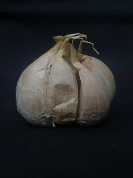 Garlic on black background Foto stock