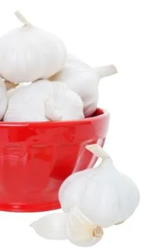 Garlic in bowl Stock Photos