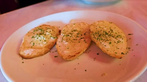 Garlic bread with parsely on the top Stock Footage 325217485