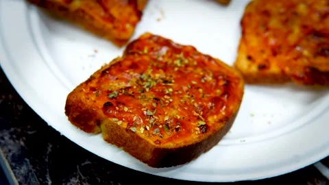 Garlic Bread Quartet Presented on Plate in Delhi Eatery. Stock Footage 257867382
