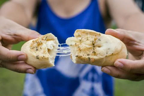 Garlic bread stuffed with cheese 스톡 사진