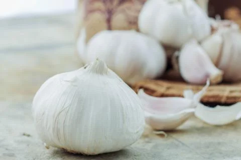 Garlic on cement. Stock Photos