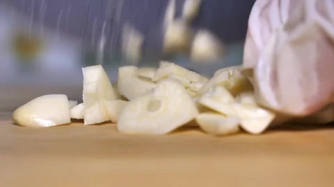 Garlic Chopping with a Kitchen Knife Stock Footage 311268959