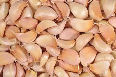 Garlic cloves background Stock Photos