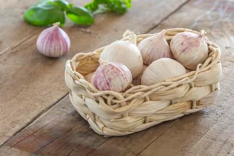 Garlic cloves in a basket 写真素材