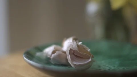 Garlic cloves on a plate Stock Footage 127146361