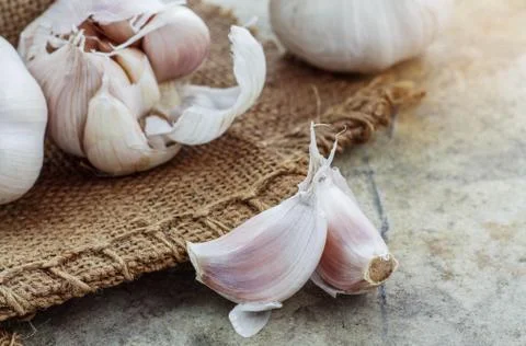 Garlic cloves on table. Stock Photos