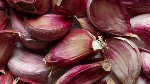 Garlic cloves texture background zooming in and seamless looping Stock Footage 141448951