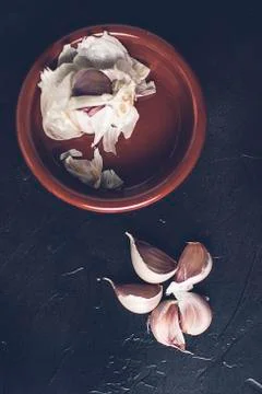 Garlic cloves in a vintage setting. Stock Photos