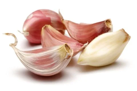 Garlic cloves on white background Stock-Fotos
