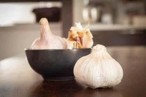 Garlic clovesin kitchen Stock Photos