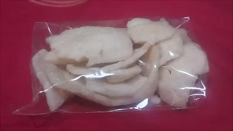 Garlic Crackers in Plastic Packaging Stock Footage 296850738