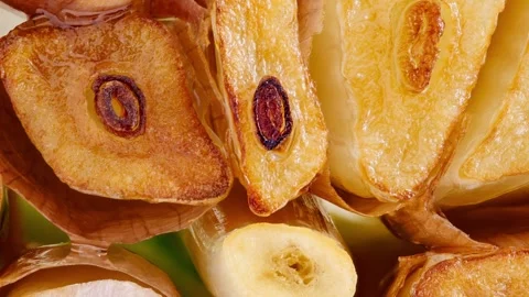 Garlic cut baked close-up, rotating, turning, macro Stock-Footage 243989377