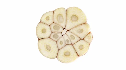Garlic cut in half, rotating on white background Stock-Footage 242359680