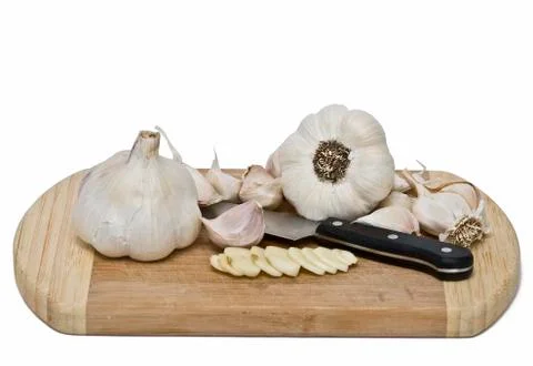 Garlic on the cutting table. Stock Photos