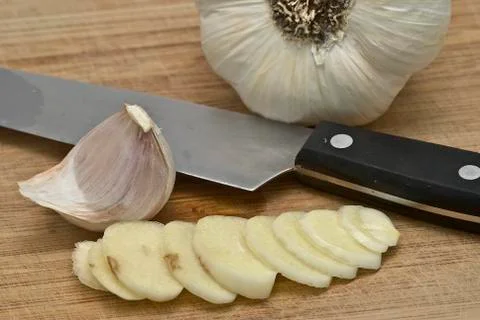 Garlic on the cutting table. Stock Photos