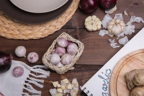 Garlic on a desk Stock Photos