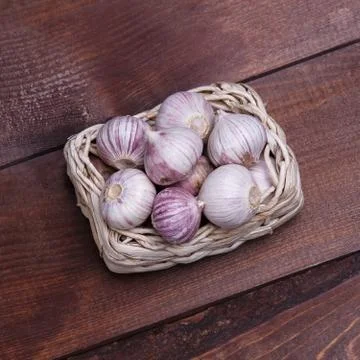 Garlic on a desk Stock Photos