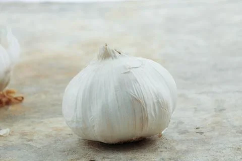 Garlic on floor. Stock-Fotos