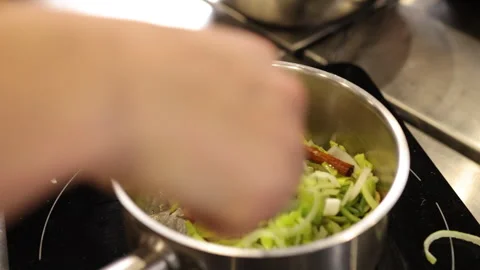 Garlic leeks, Pan cinnamon, Leeks simmering Stock Footage 311985577
