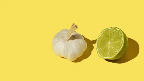 Garlic, lime, basil leaves appear on the screen in turn. Stock Footage 169280461
