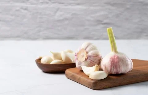Garlic on a marble table Stock Photos