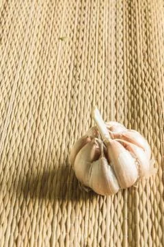Garlic on mat background Stock Photos