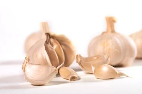 Garlic over white Stock Photos