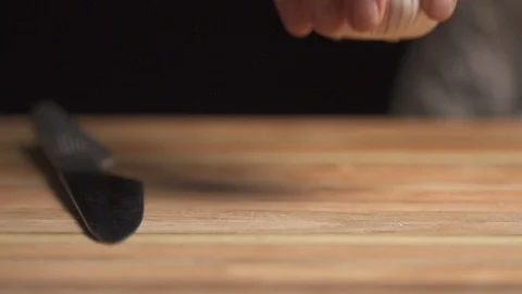 Garlic placed on a cutting board Stock Footage 127121250
