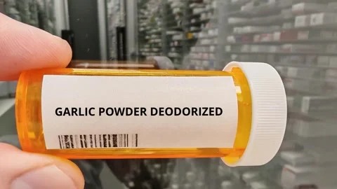 GARLIC POWDER DEODORIZED herbal botanical supplement for immune and antioxidant Video stock 346727830