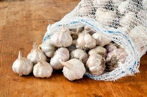 Garlic in a sack Stock Photos