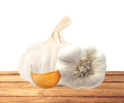 Garlic on table isolated on white Foto stock