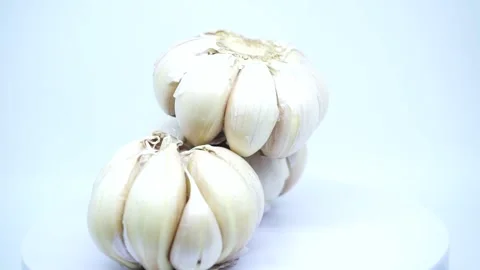 Garlic on a white background  Stock Footage 219730145