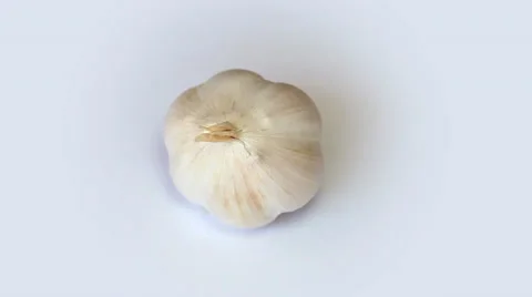Garlic on white background rotation Video stock 35520285