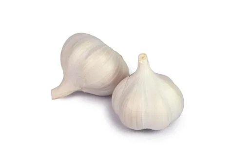 GARLIC IN WHITE BACKGROUND - VEGITABLE Stock Photos