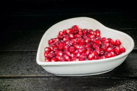 Garnet on black in dish Stock Photos