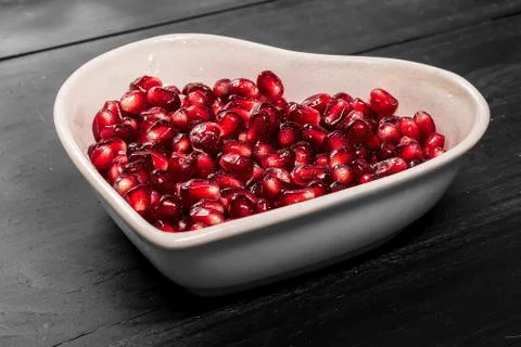 Garnet on black in dish Stock Photos