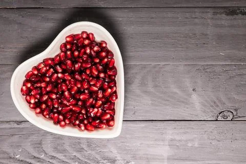 Garnet on black in dish Stock Photos