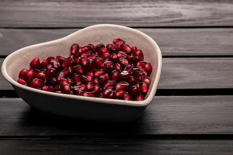 Garnet on black in dish Stock Photos