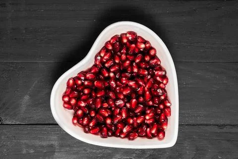 Garnet on black in dish Stock Photos