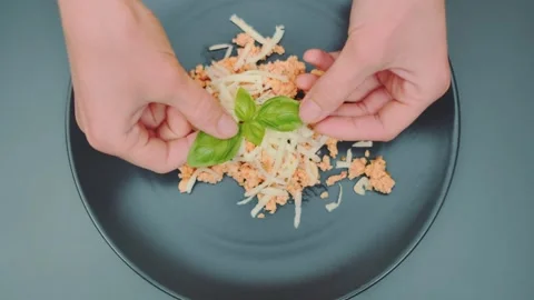 Garnish egg omelet with basil leaves Stock-Footage 252249624