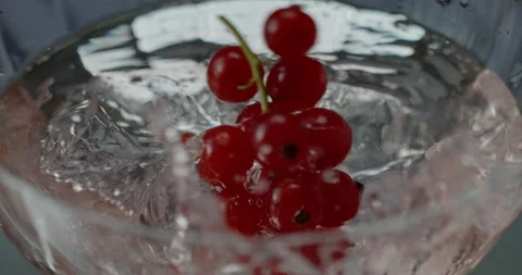 Garnish falling into a cocktail in Super Slow motion 1000 fps Stock Footage 161800810