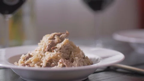 Garnish with rosemary risotto with veal fillet Stock Footage 106935095