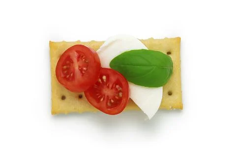 Garnished Crackers with Toppings assorted snack overhead view Stock Photos