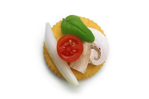 Garnished Crackers with Toppings assorted snack overhead view Stock Photos