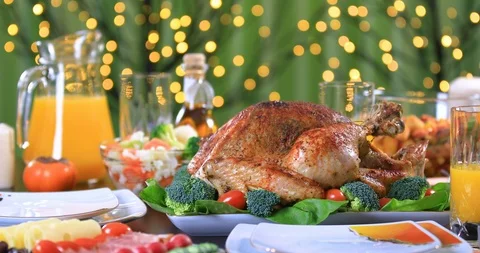 Garnished roasted turkey on festive table closeup Stock Footage 105603079