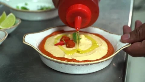 Garnishing a Delicious Sauce Stock Footage 318310253