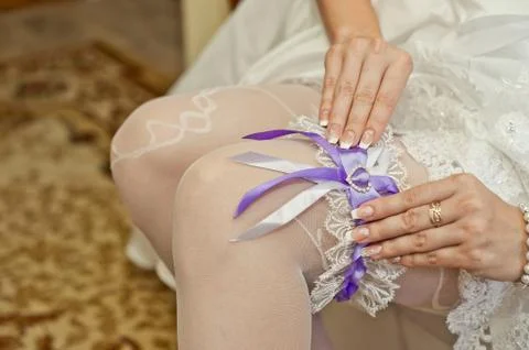 Garter of the bride. Stock Photos