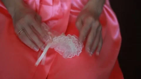 Garter on the leg of a bride Stock Footage 50149919